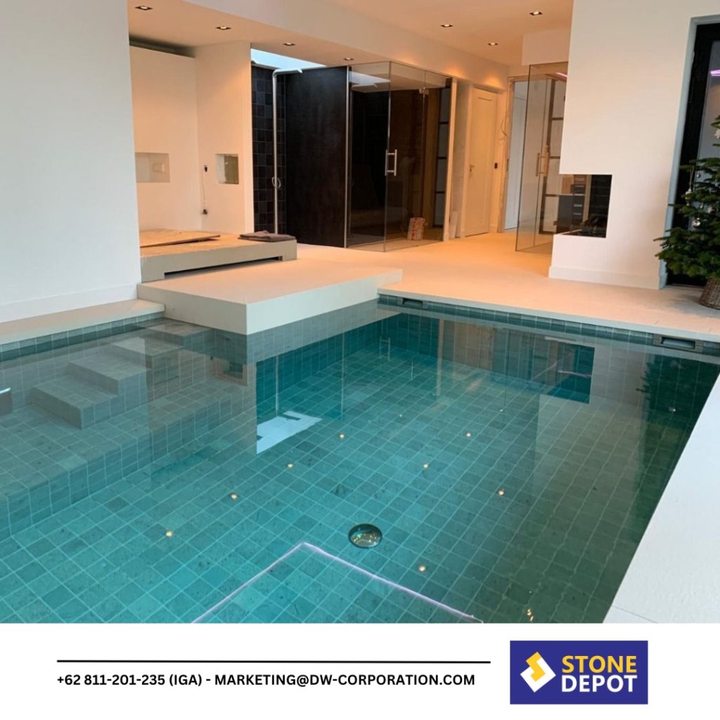 Elegant private pool with bali limestone pavers and bali green pool tiles